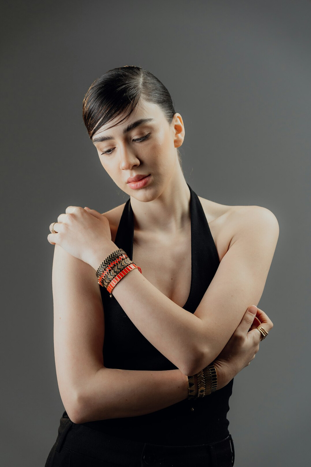 Studio portrait of a young woman with short dark hair