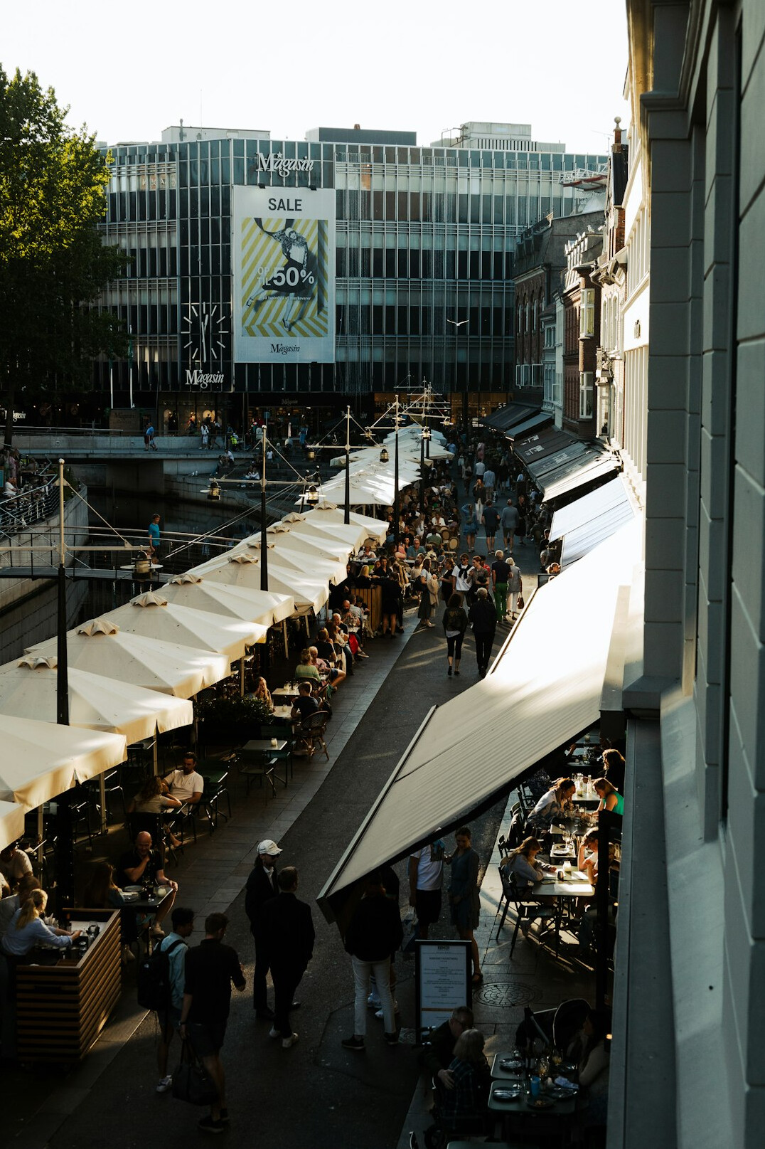 People shopping at an outdoor market stall in Denmark